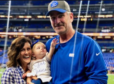 Linda Reich with spouse Frank Reich and granddaughter Bishop